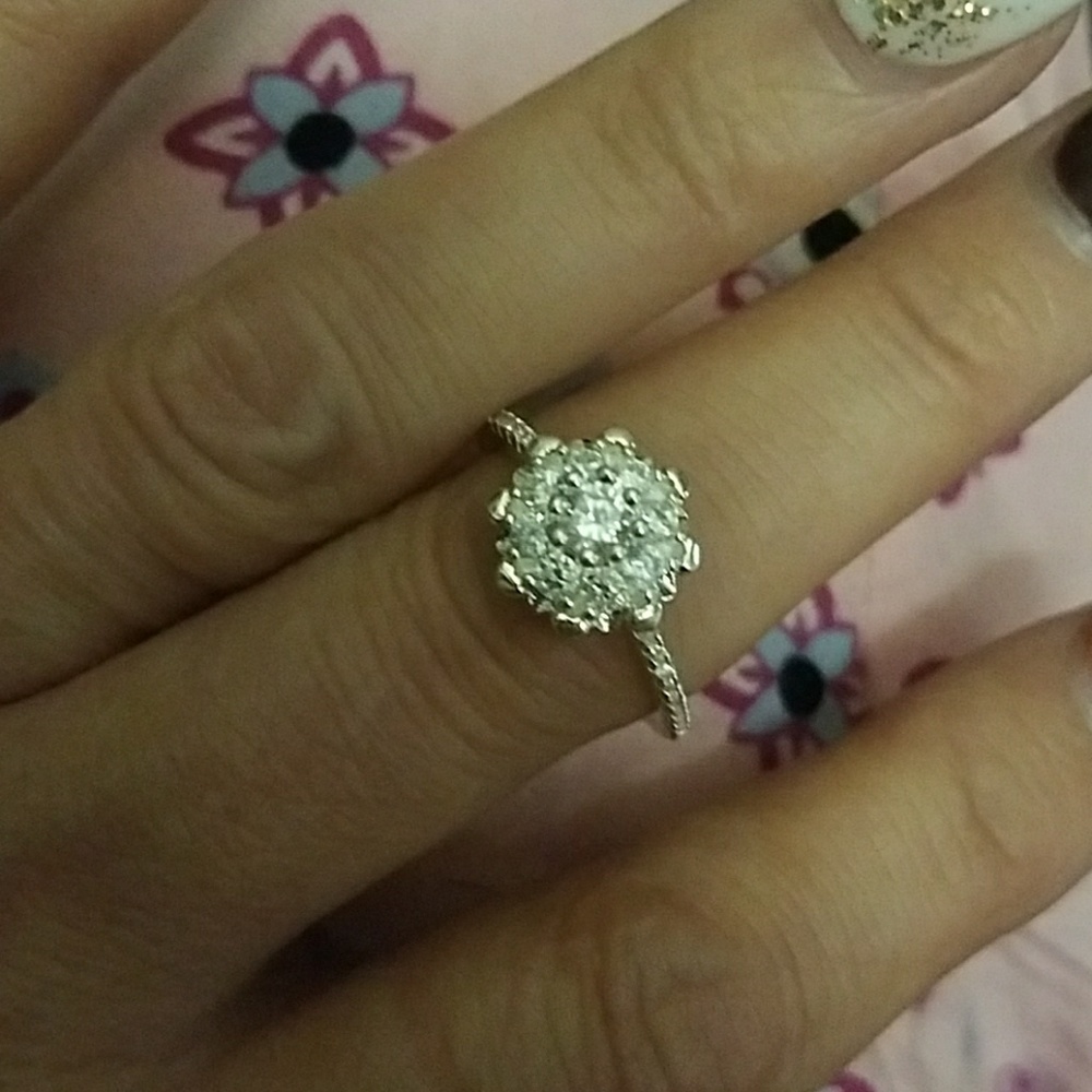 Silver and crystal/cubic ring.