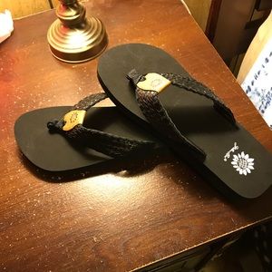 Yellow box flip flops