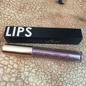 NWT glitter lipgloss*** Tocalore Luxe**33