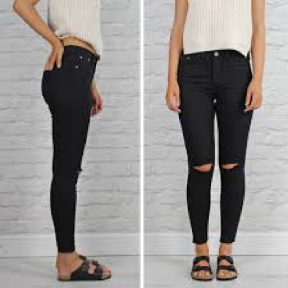 Black split knee jeans