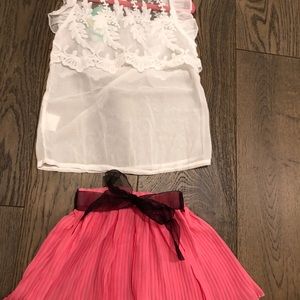 Adorable hot pink and white 2 piece skirt and top.