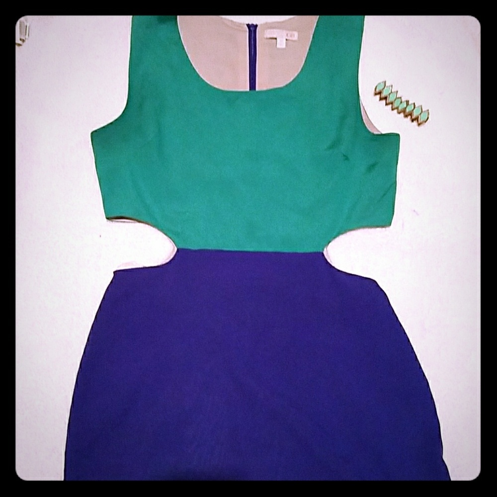 Dress with sides cut out