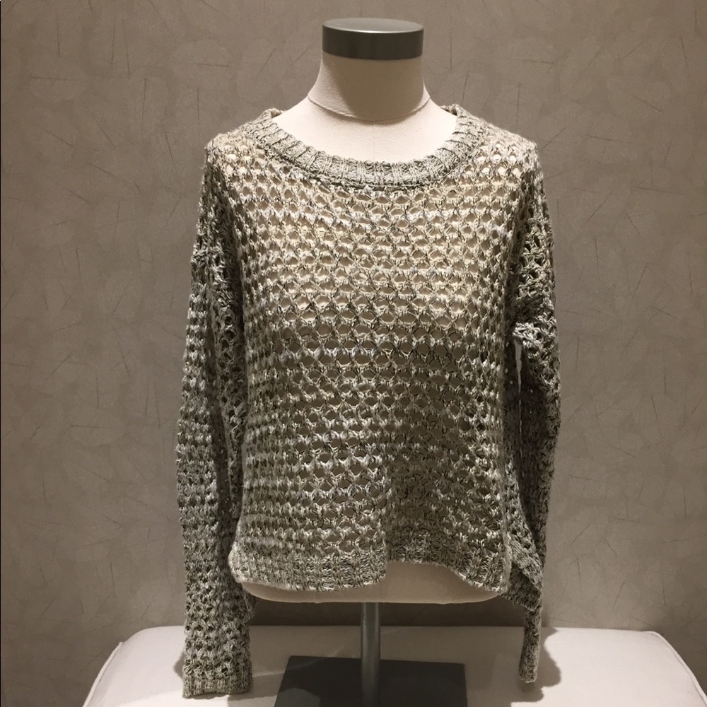Open stitch short elliptical sweater