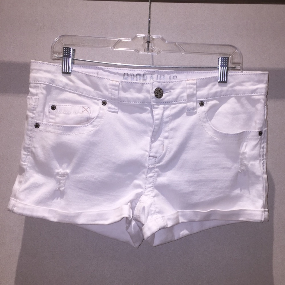 White distressed denim shorts