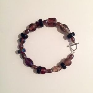 Purple and black glass beaded bracelet