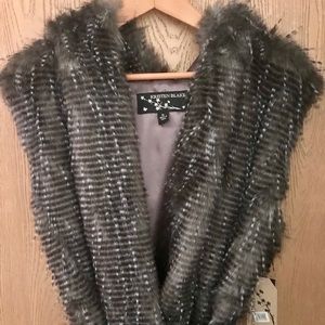 Kristen Blake faux fur vest with hood.