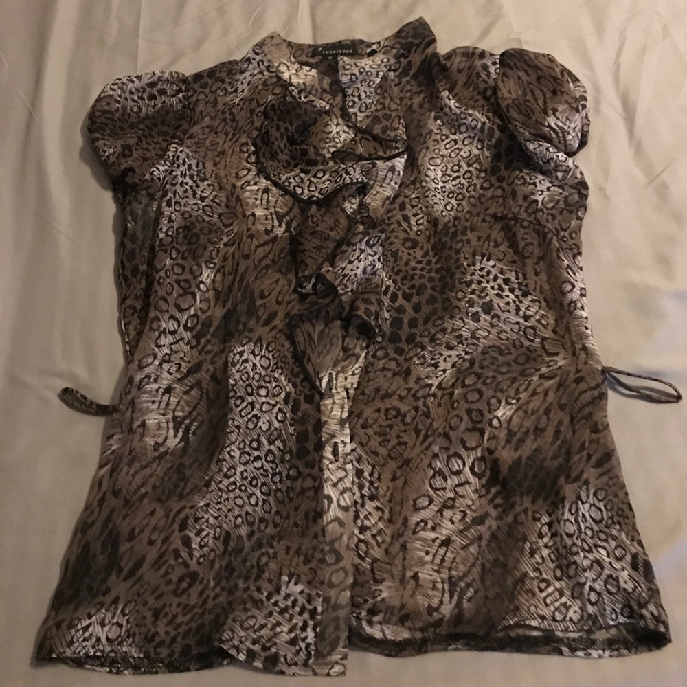 Animal print sheer short sleeve blouse.