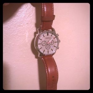 Men’s Fossil Watch with sleek wallet.