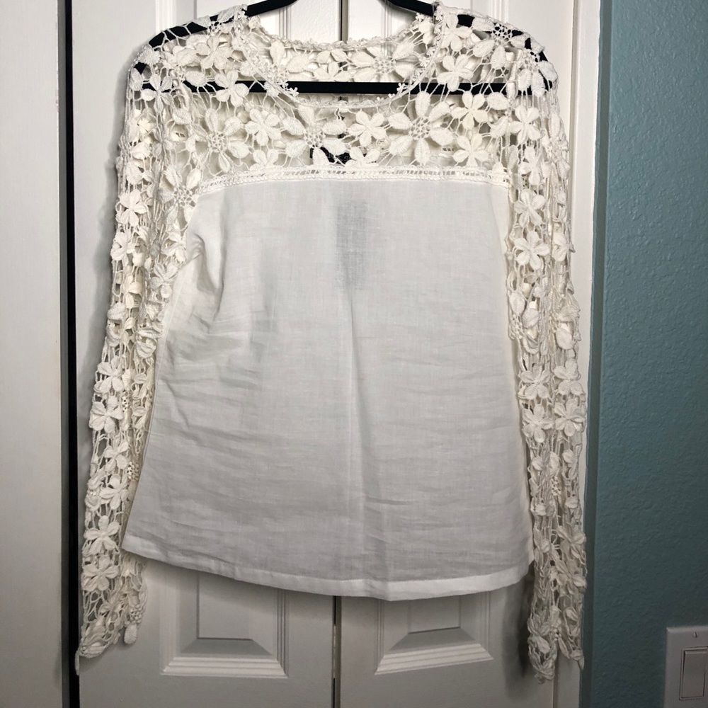 White floral blouse by Lookbook Store