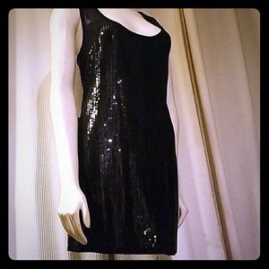 Sequined dress by bebe size medium new with tags