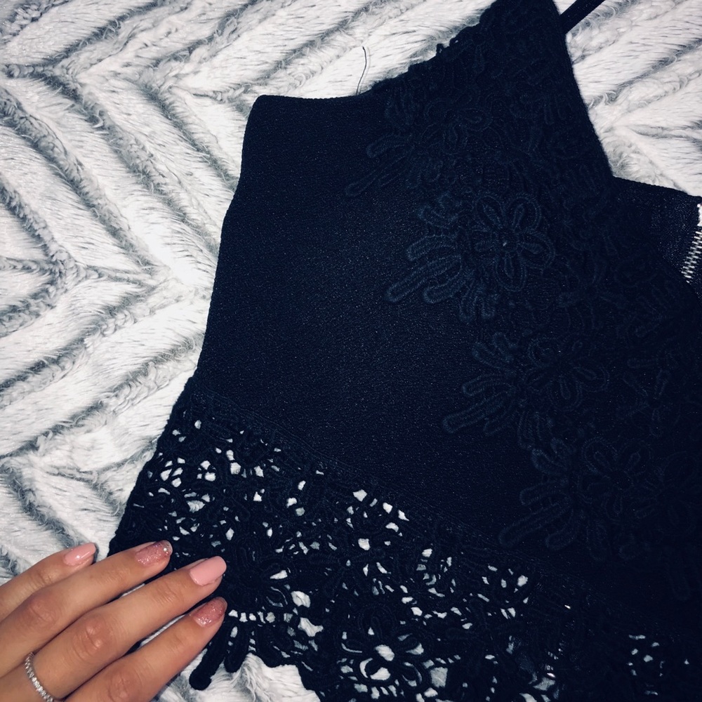 Cropped black top with lace detailing