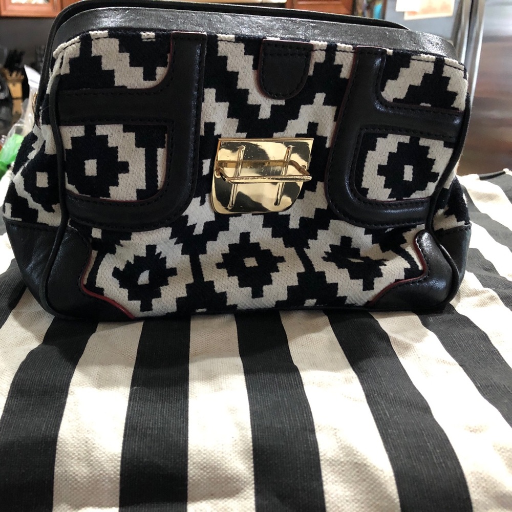 Authentic LAMB clutch bag.