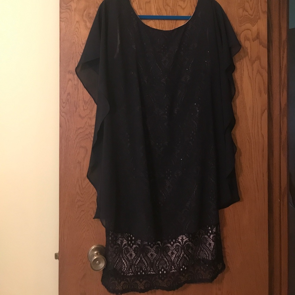 Lace overlay dress with sheer top.