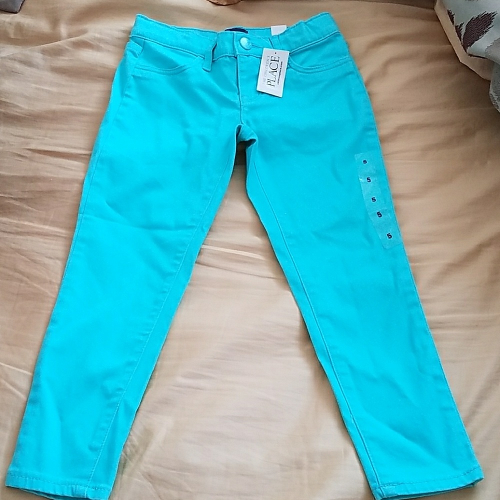 Girls teal color jeggings.