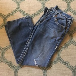 MEN'S True Religion Billy lightly tattered jeans.