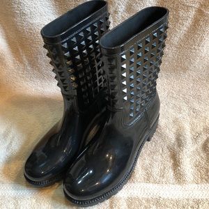 Black spiked rain boots