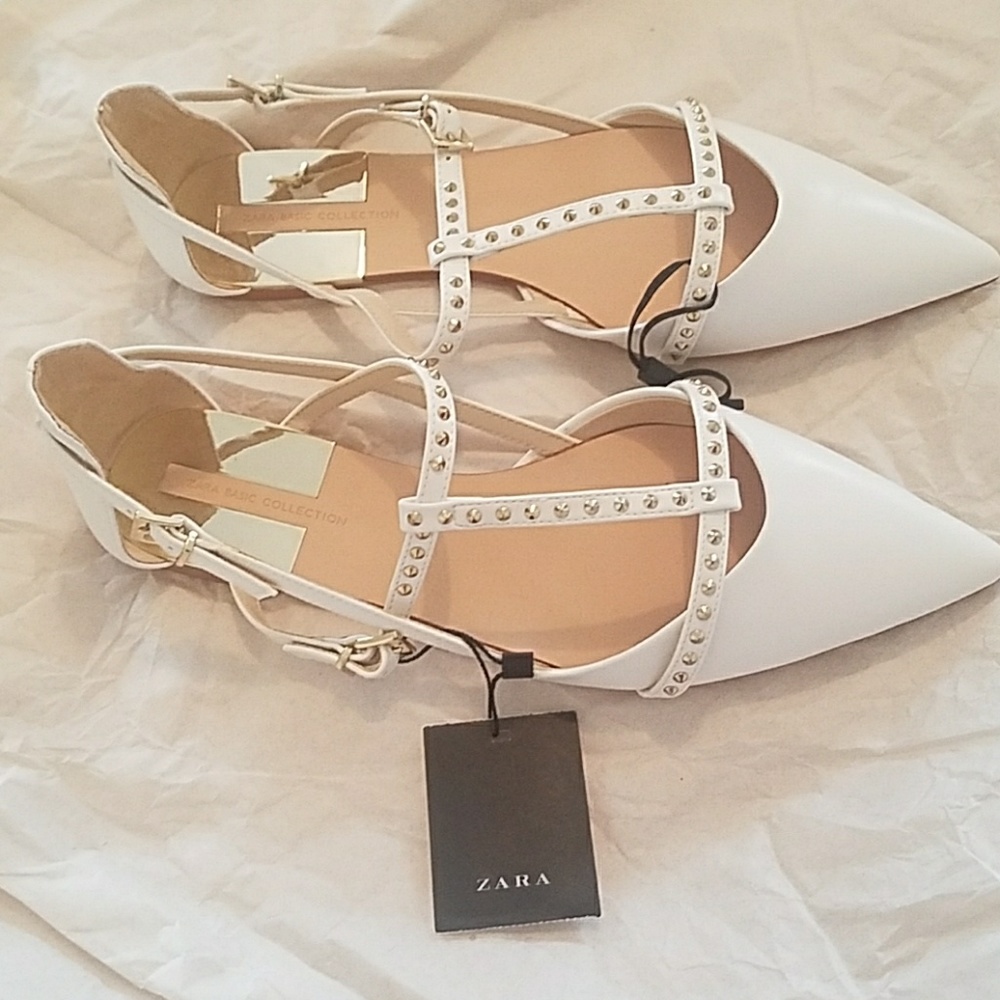 White pointed toe studded flats