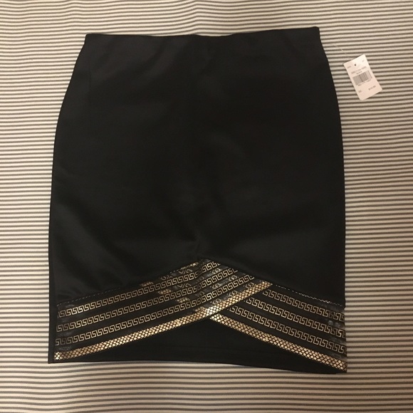 Dresses & Skirts - Black skirt with gold detailing