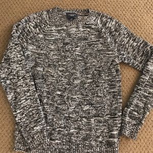 Women's black/gray sweater.
