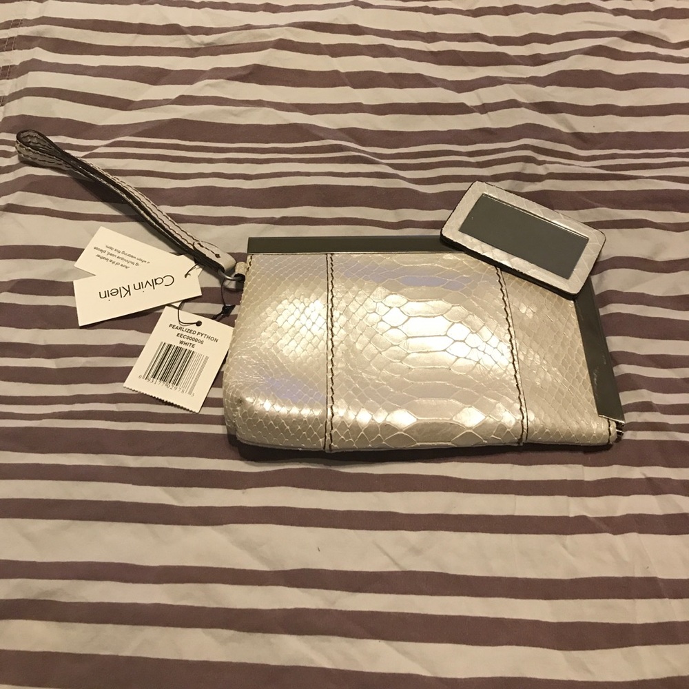 New Calvin Klein Pearlized Python wristlet