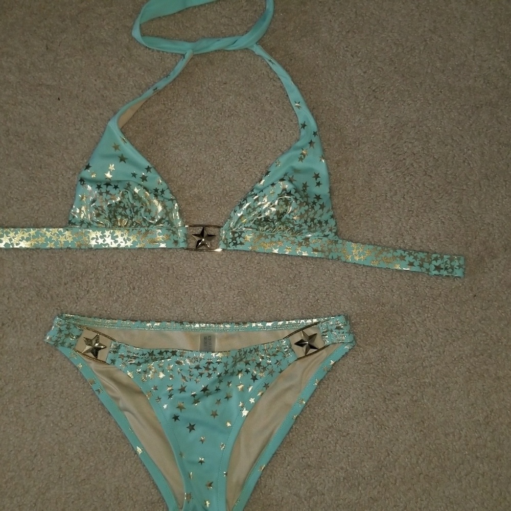 Bathing suits, sky blue with gold stars.