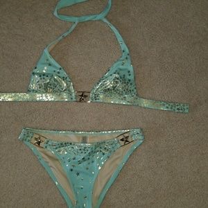 Bathing suits, sky blue with gold stars.