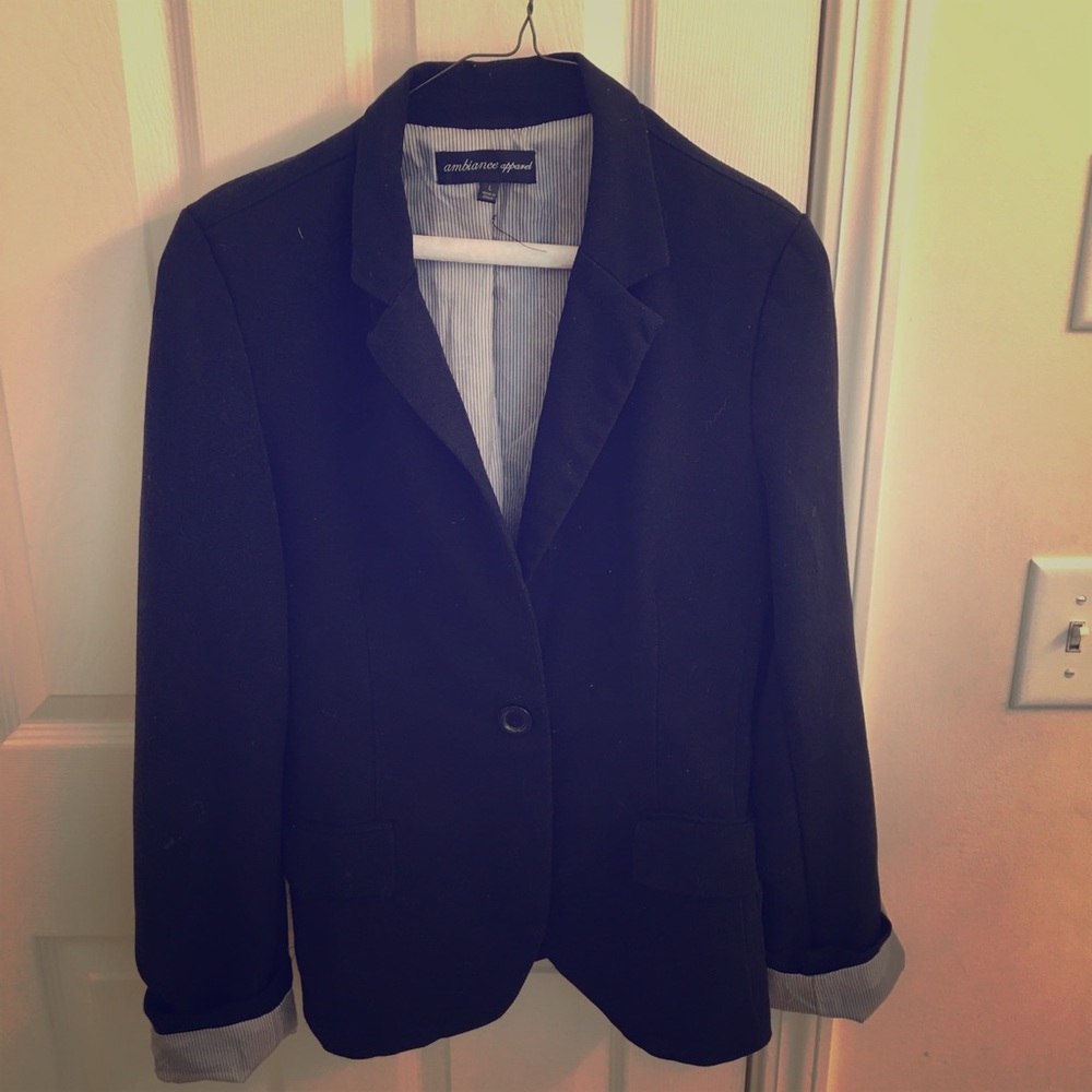Black blazer. Blue striped lining.