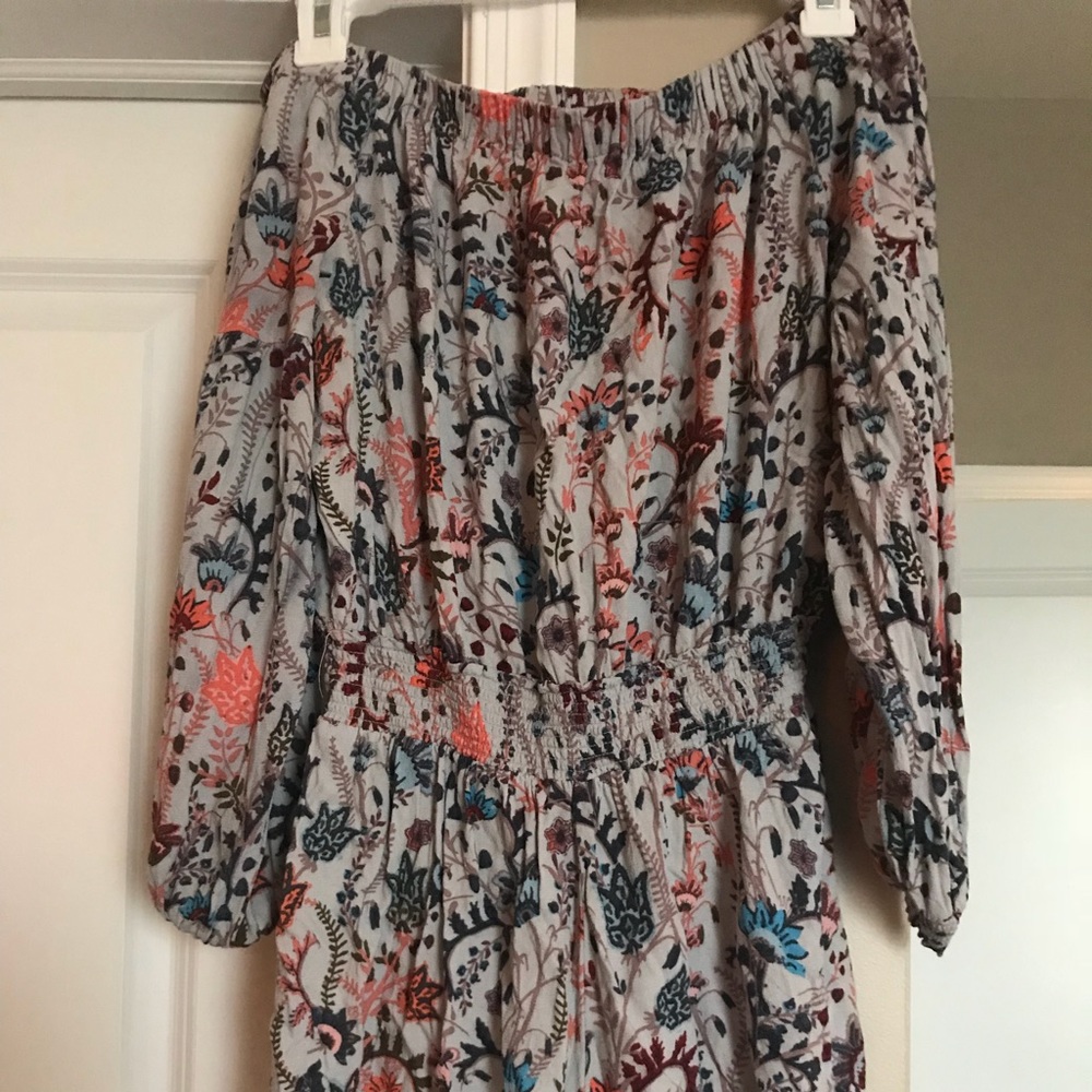 Free people open back romper!