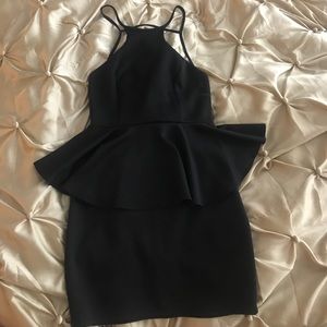 Black peplum dress. Back out