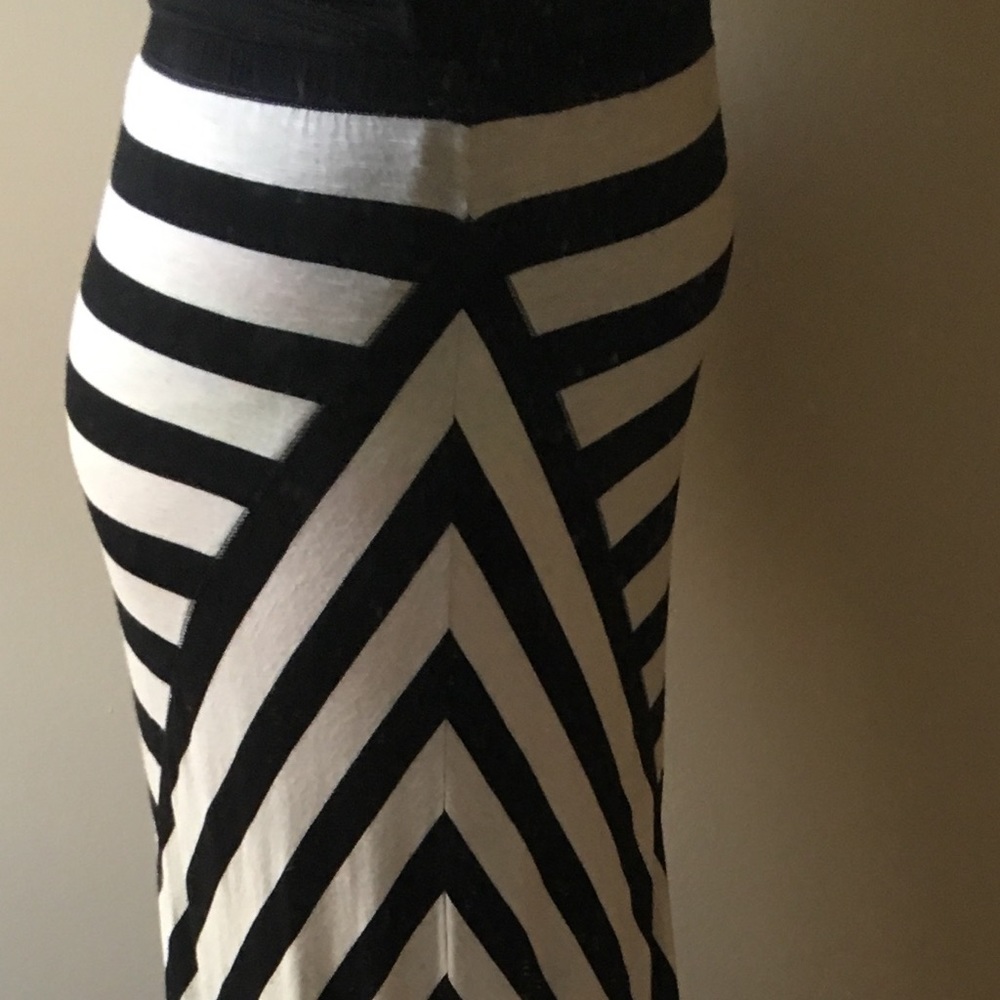 Long skirt. Black and white stripes.