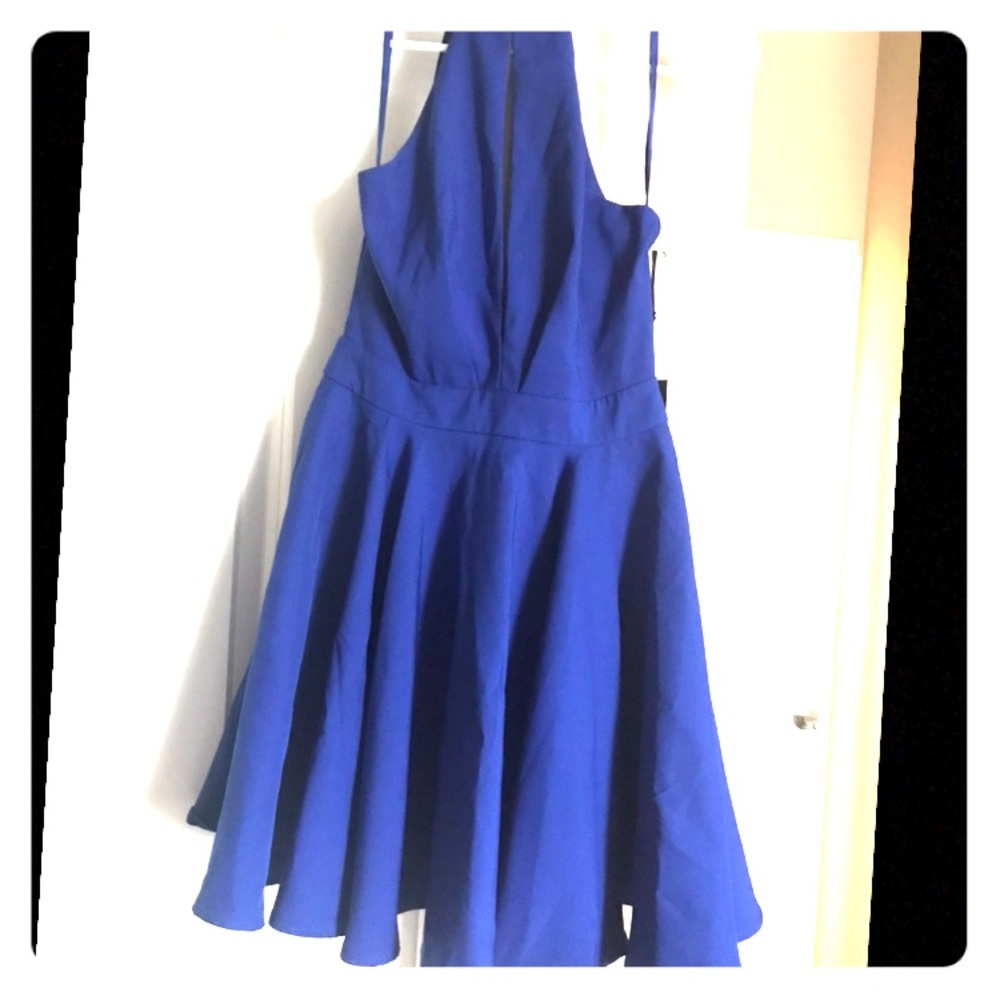 High neck , low cut , never worn cocktail dress!