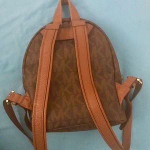 Michael kors back pack, with matching card holder