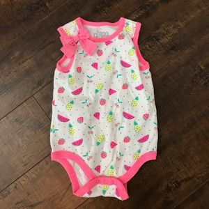 Neon onesie with pineapples, etc