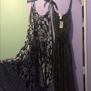 2 maternity Dresses. 1 with tags $30 each