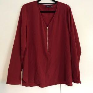 A light-weight red blouse