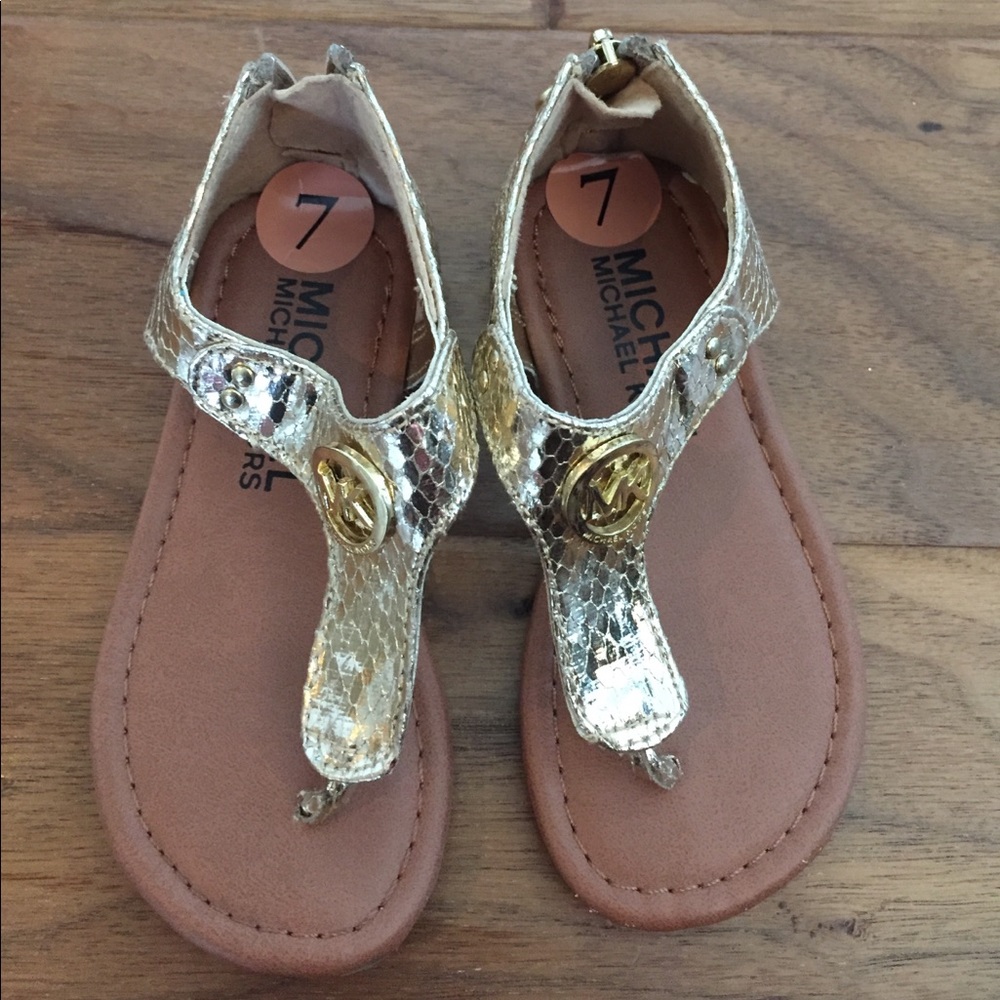 Never worn gold Michael Kors sandals