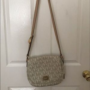 Gray monogrammed Michael Kors crossbody bag