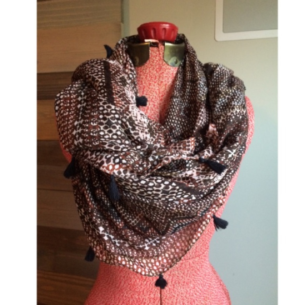 NWT- Kitara multi-colored scarf in neutral tones.