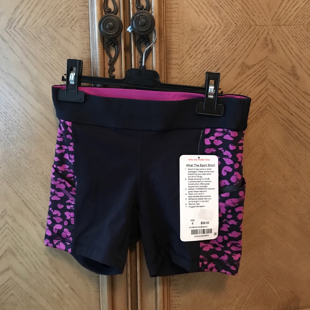 Lululemon shorts new . Dark blue color & fuchsia .