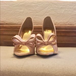 Nude Patent Leather Pumps