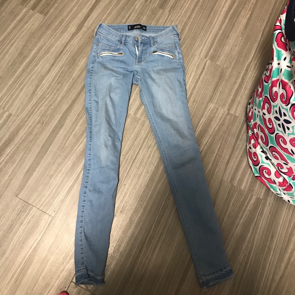 Distressed bottom lightwash jeans