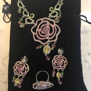 Swarovski set. Neckless, earrings, and ring.
