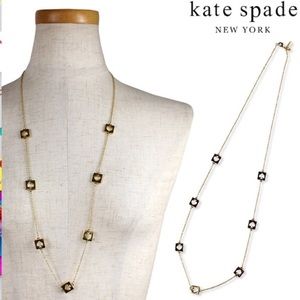 Black & Gold Kate Spade hole punch necklace