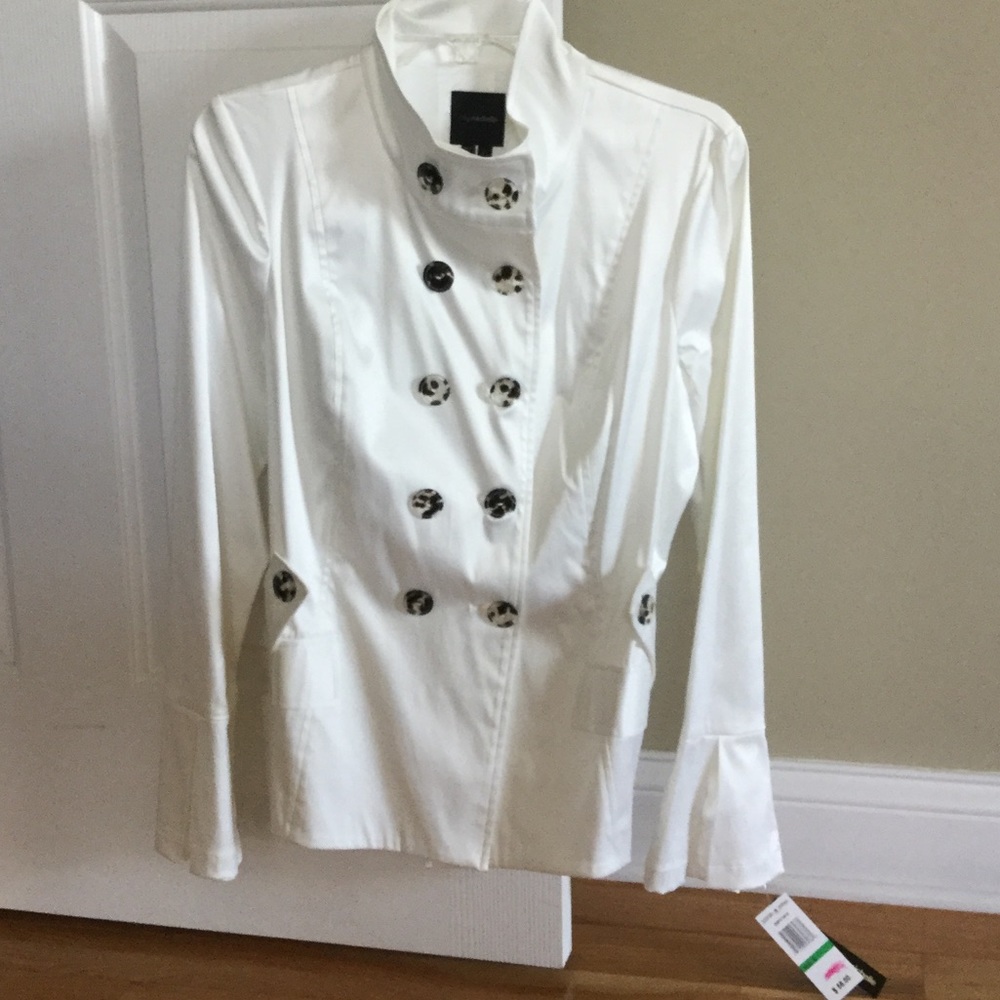 Cute white jacket with bell sleeves.