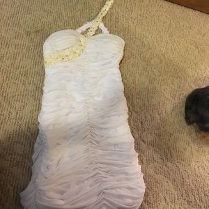 White ruffle mini dress with flower beading