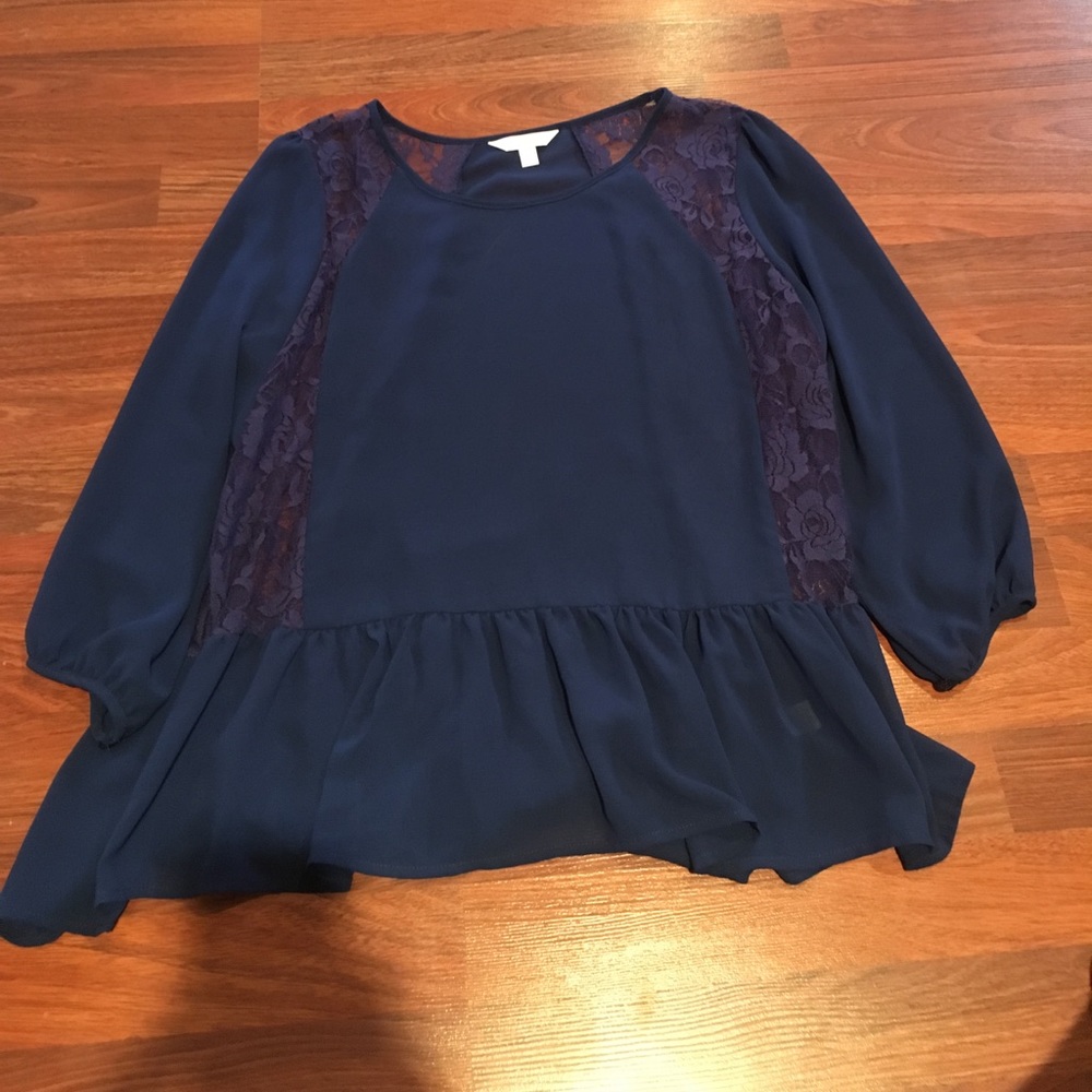 Blue peplum blouse with flower detail