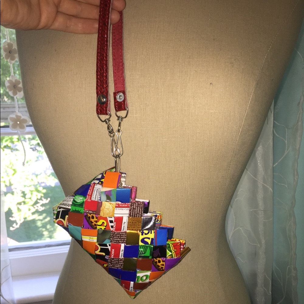 NWOT zipper clutch made out of wrappers