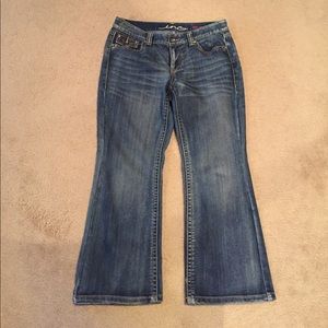 Women's jeans size 12P, short length, boot cut.
