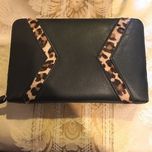 Genuine leather and cowhide clutch/wallet.