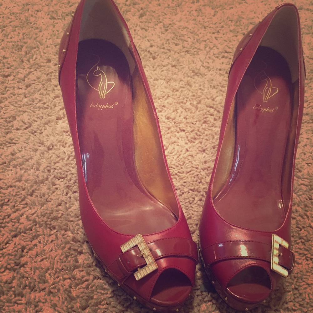 Red shoes with gold details